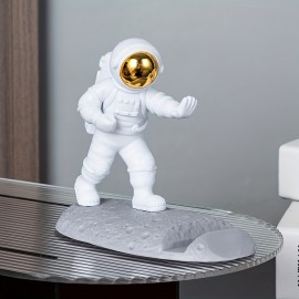Spice Up Your Desk with this Astronaut-Themed Phone Holder - Perfect for Office Decor!