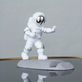 Spice Up Your Desk with this Astronaut-Themed Phone Holder - Perfect for Office Decor!