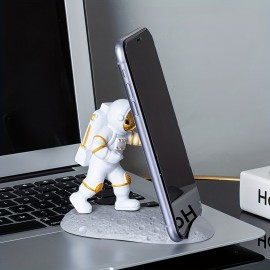 Spice Up Your Desk with this Astronaut-Themed Phone Holder - Perfect for Office Decor!